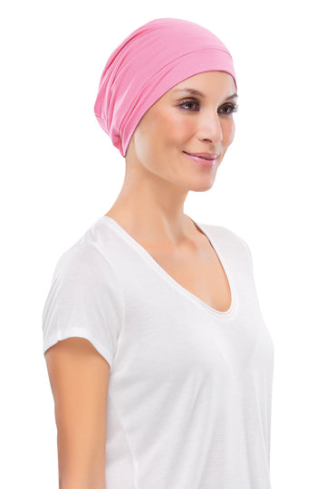 Model with hair loss wearing a pink Simple Softie by Jon Renau South Africa